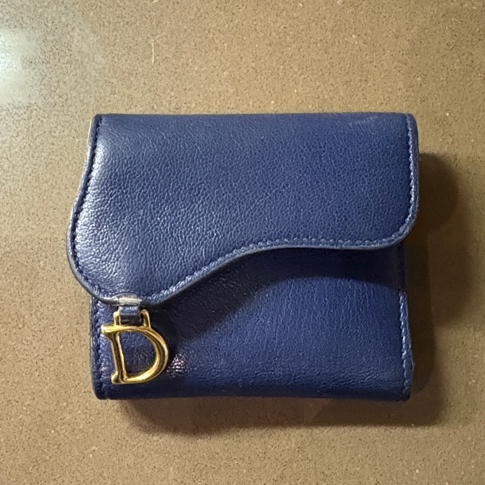 Dior Saddle Wallet in Deep Ocean Blue.